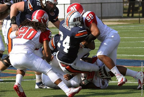 Austin Peay's Antonio Turner (50) stuffs UT Martin Abou Toure in the first quarter against UT Martin. (APSU Sports Information)