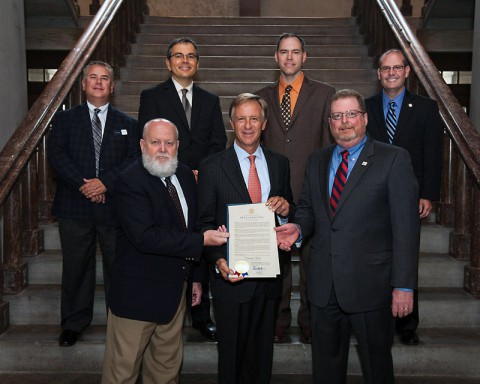 Gov. Bill Haslam, front center, presents a proclamation to the Tennessee Council of Cooperatives board of directors proclaiming October as “Cooperative Month” in Tennessee.  Pictured with the governor are, front from left, Greg Anderson, Bledsoe Telephone Cooperative, and Keith Harrison, Tennessee Farmers Cooperative. In back are Todd Blocker, Tennessee Electric Cooperative Association;  Scott Lewis, Farm Credit Mid-America;  Dan Strasser, Tennessee Farm Bureau Federation; and Tom Womack, Tennessee Department of Agriculture.