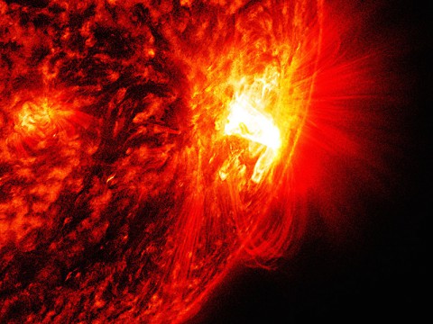A large active region erupts with a mid-level flare, an M6.6-class, in this image from NASA's SDO on the night of Oct. 27, 2014. The region will soon rotate over the right horizon of the sun and will no longer be facing Earth. (NASA/SDO) A large active region erupts with a mid-level flare, an M6.6-class, in this image from NASA's SDO on the night of Oct. 27, 2014. The region will soon rotate over the right horizon of the sun and will no longer be facing Earth. (NASA/SDO)