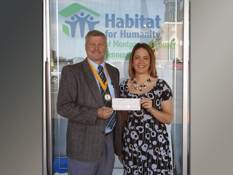 Sango United Methodist Church Pastor Willie Lyle and Shelby Logsdon, executive director of Habitat for Humanity.