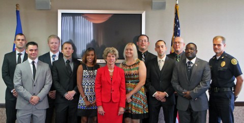 Left to Right: Cody Deskins, David Hauser, Clay Sheley, Scott Freeman, Ra’shee Showers, Mayor Kim McMillan,Tracy Hughes, Travis Kretz, Thomas McCraw, David Moore, Ronald Myers, and Chief Al Ansley.