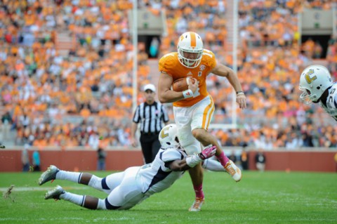 Quarterback Justin Worley #14 of the Tennessee Volunteers runs for a touchdown during the Homecoming game between the UT Chattanooga Mocs and the Tennessee Volunteers at Neyland Stadium in Knoxville, TN. (Randy Sartin/Tennessee Athletics)