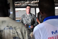 Sgt. Kevin Scranton-Chaney, a DoD Ebola Training Team trainer, Joint Forces Command – United Assistance, teaches volunteers how to properly mix the decontaminate solution used at Ebola treatment units, during one of the numerous classes held at the National Police Training Center, Paynesville, Liberia, Oct. 30, 2014. The training consists of hands-on and classroom instruction split in two phases – cold phase and hot phase. In the cold phase, students go through intense, repetitive training in a simulated ETU. During the hot phase, which is taught by nongovernmental organizations, the students care for Ebola patients in an operational ETU under close supervision. The medical training is conducted by the DoD Ebola Training Team under the Joint Forces Command – United Assistance, which supports the U.S. Agency for International Development in the effort to control the spread of Ebola.   (Sgt. 1st Class Nathan Hoskins/U.S. Army)