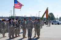 Command Sgt. Maj. David J. Tookmanian, the outgoing senior enlisted adviser for the 716th Military Police Battalion, 16th Military Police Brigade, supported by the 101st Sustainment Brigade, 101st Airborne Division, passes the battalion colors to Lt. Col. Leevaine Williams Jr., the commander of the 716th MP Battalion, during a change of responsibility ceremony Oct. 22, at Fort Campbell, Ky. In the time since he assumed responsibility as the command sergeant major for the battalion on May 16, 2013, Tookmanian assisted the battalion commander in leading the Soldiers of the 716th through several changes, including changing the battalion’s higher headquarters from the 89th Military Police Brigade to the 16th Military Police Brigade, using borrowed military manpower from the division to augment the access control point mission and using new law enforcement techniques to reduce crime on Fort Campbell. (Sgt. Leejay Lockhart, U.S. Army)