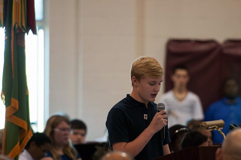 Jacob Slight, a student at West Creek Middle School in Clarksville, Tenn., speaks about the importance of the sacrifices his brother, Tim, has made to defend the nation during a a Veterans Day event Nov. 7 at West Creek Middle School. (U.S. Army photo by Sgt. Leejay Lockhart)