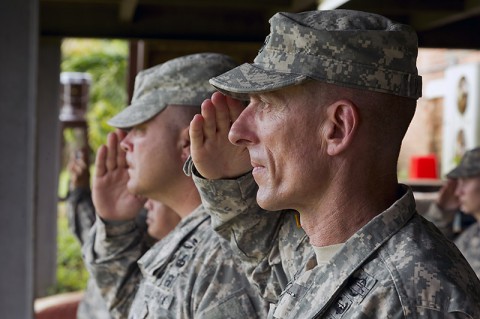 Maj. Gen. Gary Volesky, Commander of Joint Force Command - United Assistance (JFC-UA), and Command Sgt. Maj. Kirk Hines, Acting Senior Enlisted Adviser for JFC-UA, render honors to the colors at the guide-on uncasing for 101st Sustainment Brigade in Firestone, Liberia on Nov. 12, 2014. United Assistance is a Department of Defense operation to provide command and control, logistics, training and engineering support to U.S. Agency for International Development-led efforts to contain the Ebola virus outbreak in West African nations. (Sgt. 1st Class Brien Vorhees) Maj. Gen. Gary Volesky, Commander of Joint Force Command - United Assistance (JFC-UA), and Command Sgt. Maj. Kirk Hines, Acting Senior Enlisted Adviser for JFC-UA, render honors to the colors at the guide-on uncasing for 101st Sustainment Brigade in Firestone, Liberia on Nov. 12, 2014. United Assistance is a Department of Defense operation to provide command and control, logistics, training and engineering support to U.S. Agency for International Development-led efforts to contain the Ebola virus outbreak in West African nations. (Sgt. 1st Class Brien Vorhees)