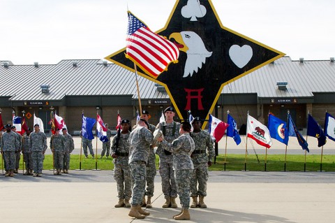 Col. Kimberly J. Daub and Command Sgt. Maj. Ian C. Griffin the command team of the 101st Sustainment Brigade case the brigade colors in its sheath during a color casing ceremony Oct. 27 at Fort Campbell, Ky. Since receiving the order to deploy to Africa, the unit has conducted both mandatory pre-deployment training and special training on the proper use of personal protective gear to protect Soldiers from contracting the Ebola virus disease and other disease prevention measures necessary for the region (Sgt. Sinthia Rosario)