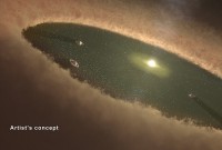 This artist’s concept depicts giant planets circling between belts of dust. Scientists think the star system HD 95068 may have a planetary architecture similar to this. While the star system’s two dust belts are known, along with one massive planet, more giant planets may lurk unseen. (NASA/JPL-Caltech)