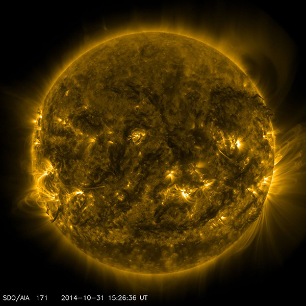The RAISE mission will focus on an active region — an area of complex and intense magnetic activity — in the sun’s atmosphere. The region can be seen in this image from NASA’s SDO as the bright, magnetic loops hovering above the sun’s surface on the left-hand side just below the mid-line. (NASA/SDO)