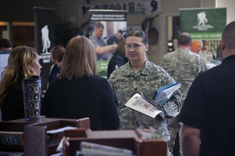 Staff Sgt. Shirley Clingan, a Soldier at Fort Campbell's Warrior Transition Battalion, discusses internship opportunities with Defense Finance and Accounting Service during Operation Warfighter's quarterly career fair at the Soldier and Family Assistance Center Nov. 19. (U.S. Army photo by David E. Gillespie) Staff Sgt. Shirley Clingan, a Soldier at Fort Campbell's Warrior Transition Battalion, discusses internship opportunities with Defense Finance and Accounting Service during Operation Warfighter's quarterly career fair at the Soldier and Family Assistance Center Nov. 19. (U.S. Army photo by David E. Gillespie)