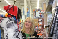 Sherry Davis shows her shopper a Jenga game
