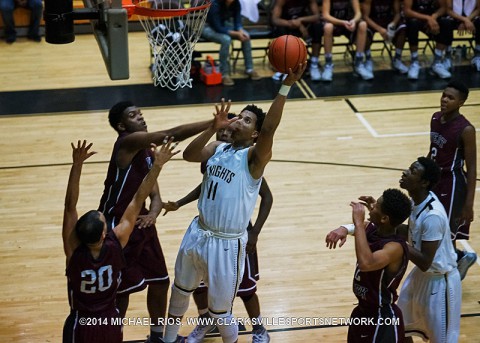 Kenwood Boy's Basketball gets 66-49 win over Kenwood.