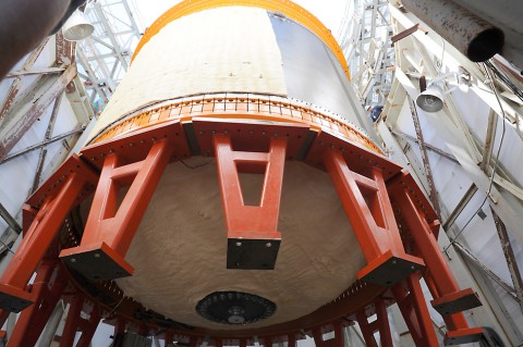 18-foot-diameter (5.5-meter) composite cryotank is lowered into a structural test stand at Marshall Space Flight Center. (NASA/MSFC)