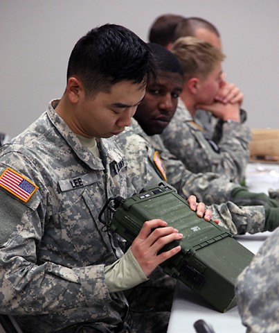 A Soldier from 1st Brigade Combat Team, 101st Airborne Division receives hands-on radio training from 5th Special Forces Group Jan. 12 on Fort Campbell. The training concluded a five-part combined training exercise between the two units. (Spc. Robert Venegas, 5th SFG(A) Combat Camera) A Soldier from 1st Brigade Combat Team, 101st Airborne Division receives hands-on radio training from 5th Special Forces Group Jan. 12 on Fort Campbell. The training concluded a five-part combined training exercise between the two units. (Spc. Robert Venegas, 5th SFG(A) Combat Camera)