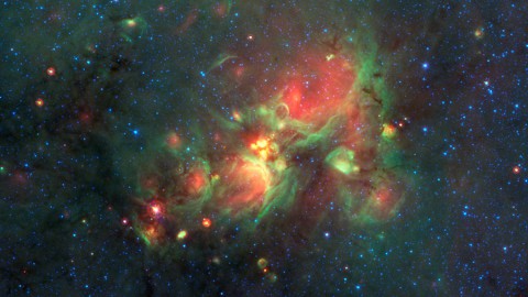 Volunteers using the web-based Milky Way Project brought star-forming features nicknamed "yellowballs" to the attention of researchers, who later showed that they are a phase of massive star formation. (NASA/JPL-Caltech)