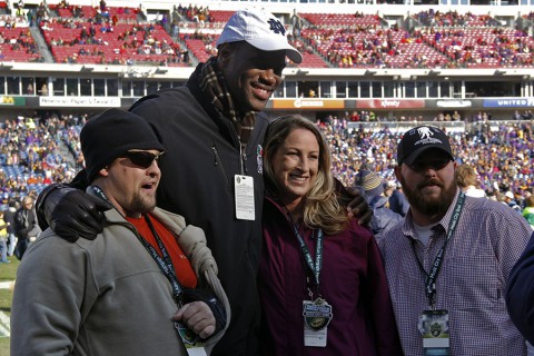 Eight wounded warriors, their families, and two Gold Star families were invited to the Franklin American Mortgage Music City bowl to be honored during each event leading up to the game on Dec. 30, 2014. Before the game, the group was escorted onto the field. Several wounded warriors posed for pictures with David Robinson, famous former NBA basketball player and father to Notre Dame wide receiver Corey Robinson.