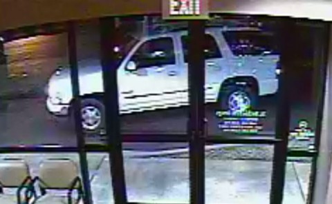 The suspects were driving a white GMC Yukon or a Chevrolet Tahoe. The suspects were driving a white GMC Yukon or a Chevrolet Tahoe.