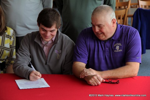 Montgomery Central's Tyler Britt signs golf scholarship with Bethel University.