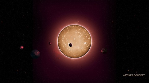 The tightly packed system, named Kepler-444, is home to five small planets in very compact orbits. The planets were detected from the dimming that occurs when they transit the disk of their parent star, as shown in this artist's conception. (Tiago Campante/Peter Devine)