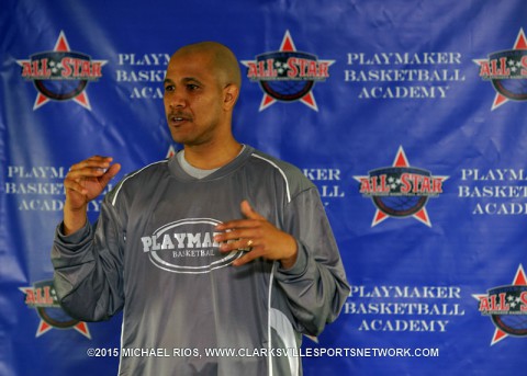 Terry Boykin talks to middle school basketball players and their parents Sunday afternoon.