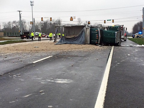  dump truck traveling eastbound on Purple Heart Parkway struck the driver side of a four-door car traveling northbound on Evans Road.