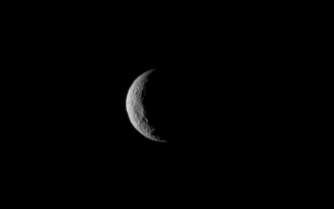 The slim crescent of Ceres smiles back as the dwarf planet awaits the arrival of an emissary from Earth. (NASA) The slim crescent of Ceres smiles back as the dwarf planet awaits the arrival of an emissary from Earth. (NASA)