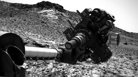 This March 4, 2015, image from the Navcam on NASA's Curiosity Mars rover shows the position in which the rover held its arm for several days after a transient short circuit triggered onboard fault-protection programming to halt arm activities on Feb. 27th. (NASA/JPL-Caltech/MSSS)