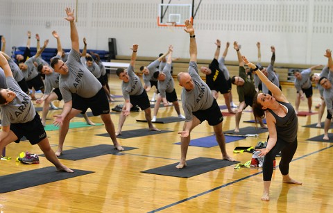 Connie Simmons, a yoga instructor with Joined Forces Yoga, instructs a class to Soldiers with the 2nd Brigade Combat Team, 101st Airborne Division, during one of the weekly classes offered by Joined Forces Yoga. Joined Forces Yoga is a nonprofit organization that provides free yoga classes to service members, veterans, family members and Department of Defense civilians. (U.S. Army photo by Sgt. Sierra A. Fown, 2nd Brigade Combat Team, 101st Airborne Division (Air Assault) Public Affairs)