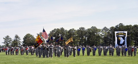 Soldiers from the 159th Combat Aviation Brigade, 101st Airborne Division (Air Assault), pay honors to the nation during the national anthem at the Thunder Brigade's inactivation ceremony at the division parade field on Fort Campbell, Ky., May 7, 2015. The 159th CAB cased its brigade colors for the final time during the ceremony, as well as all of its subordinate battalion colors and company guidons. (Staff Sgt. Joel Salgado, 3rd Brigade Combat Team, 101st Airborne Division (Air Assault) Public Affairs)