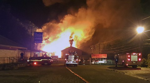 Fire destroys Building behind Starlite Lounge. (MCSO Deputy Randy Paddock and CPD Officer James Baker) Fire destroys Building behind Starlite Lounge. (MCSO Deputy Randy Paddock and CPD Officer James Baker)