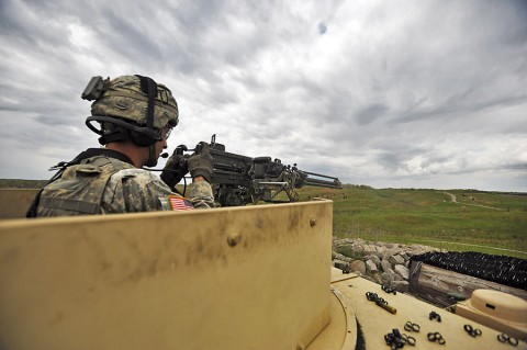 A Soldier assigned to Company D, 1st Battalion, 187th Infantry Regiment, 3rd Brigade Combat Team, 101st Airborne Division, engages targets at St. Vith Range at Fort Knox, KY, April 30th, 2015. The Soldiers from Dragon Company trained at Fort Knox as part of a crew, section and platoon certification used to verify the heavy weapons company's ability to provide fire support to the battalion's rifle companies. (Staff Sgt. Joel Salgado, 3rd Brigade Combat Team, 101st Airborne Division (air Assault) Public Affairs)