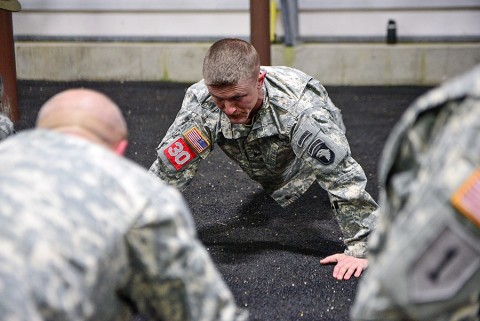 First Lt. Dustin Ballentine, an engineer with the 21st Engineer Battalion, 3rd Brigade Combat Team, 101st Airborne Division (Air Assault), performs pushups during the physical fitness test of the 2015 Best Sapper Competition at Fort Leonard Wood, Mo., April 21, 2015. The fitness test kicked off the three-day competition, during which 46 teams from across the Army competed for the title “best Sappers.” (U.S. Army photo by Sgt. Samantha Parks, 1st Brigade Combat Team, 101st Airborne Division (Air Assault) Public Affairs)