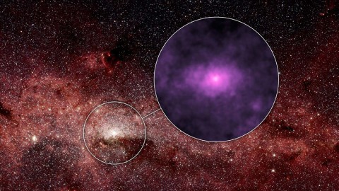 NASA's Nuclear Spectroscopic Telescope Array, or NuSTAR, has captured a new high-energy X-ray view (magenta) of the bustling center of our Milky Way galaxy. (NASA/JPL-Caltech)