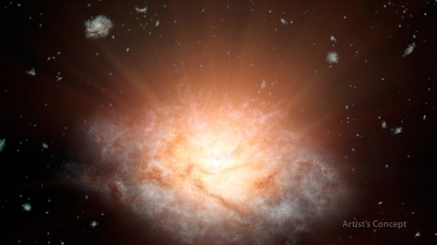 This artist's concept depicts the current record holder for the most luminous galaxy in the universe. (NASA/JPL-Caltech)