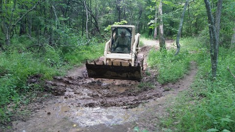 Spc. Jordan Seui, a horizontal construction engineer, with Company A, 39th Brigade Engineer Battalion, 2nd Brigade Combat Team, 101st Airborne Division (Air Assault), performs maintenance with an S150 Bobcat, for on the Warrior Challenge Obstacle and Mud Run course, at Fort Campbell, Ky., June 17, 2015. (Sgt. 1st Class Matthew Shane, 39th Brigade Engineer Battalion BEB, 2nd Brigade Combat Team BCT, 101st Airborne Division (Air Assault)) Spc. Jordan Seui, a horizontal construction engineer, with Company A, 39th Brigade Engineer Battalion, 2nd Brigade Combat Team, 101st Airborne Division (Air Assault), performs maintenance with an S150 Bobcat, for on the Warrior Challenge Obstacle and Mud Run course, at Fort Campbell, Ky., June 17, 2015. (Sgt. 1st Class Matthew Shane, 39th Brigade Engineer Battalion BEB, 2nd Brigade Combat Team BCT, 101st Airborne Division (Air Assault))