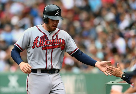 Atlanta Braves first baseman Freddie Freeman (5) celebrates after scoring a run against the Boston Red Sox during the fourth inning at Fenway Park. (Mark L. Baer-USA TODAY Sports)