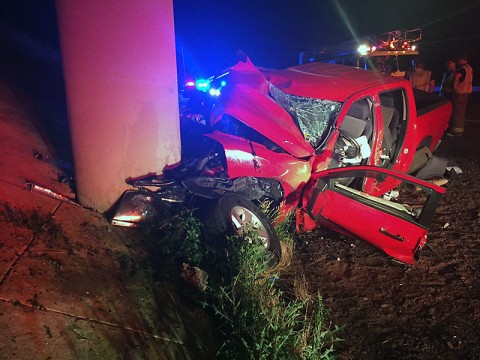 A red pickup truck collided with the concrete part of the overpass on Interstate 24 early Sunday morning. (CPD)