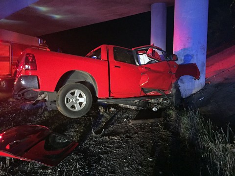 A red pickup truck collided with the concrete part of the overpass on Interstate 24 early Sunday morning. (CPD)