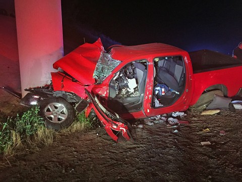 A red pickup truck collided with the concrete part of the overpass on Interstate 24 early Sunday morning. (CPD)