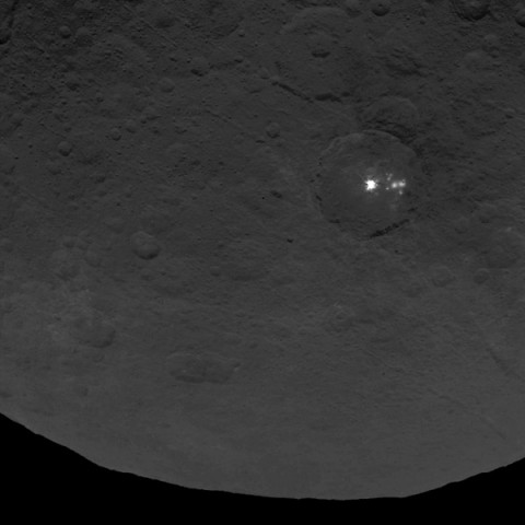 A cluster of mysterious bright spots on dwarf planet Ceres can be seen in this image, taken by NASA's Dawn spacecraft on June 9, 2015. (NASA/JPL-Caltech/UCLA/MPS/DLR/IDA)