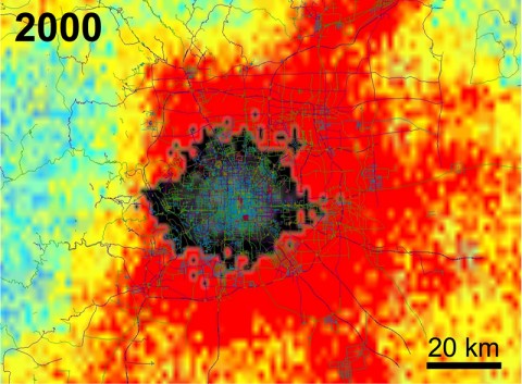 Data from NASA's QuikScat satellite show the changing extent of Beijing between 2000 and 2009 through changes to its infrastructure. Gray and black indicate buildings, with the tallest and largest buildings in the city's commercial core appearing lighter gray. Other colors show changes in areas not yet urbanized (for example, clearing land or cutting down trees), with the rate of change indicated by color. Blue-green indicates the least change, yellow-orange more change, and red the greatest change. (NASA/JPL-Caltech)