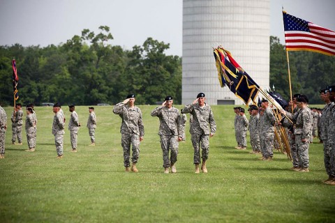 Col. Brett G. Sylvia, commander of the 2nd Brigade Combat Team, Col. Peter N. Benchoff, outgoing commander for Strike, and Maj. Gen. Gary J. Volesky, commanding general of the 101st Airborne Division (AASLT) render honors to the flag during the 2nd Brigade Combat Team’s change of command ceremony here, June 26, 2015. The official party salutes the flag during the inspection of troops. (Staff Sgt. Terrance D. Rhodes, 2nd Brigade Combat Team, 101st Airborne Division (Air Assault) Public Affairs)