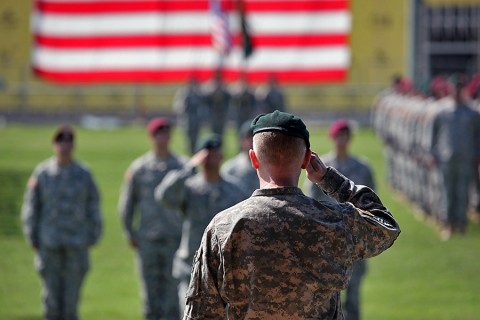 Col. Kevin C. Leahy, commander of the 5th Special Forces Group (Airborne), salutes his formation during the closing of the 5th SFG(A) change of command ceremony on Gabriel Field, July 16, 2015. (Sgt. Seth Plagenza, 5th SFG(A) Combat Camera)