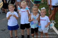 Water boys and girls waited at the finish line.