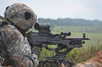 A Soldier with 2nd Battalion, 502nd Infantry Regiment, 2nd Brigade Combat Team, 101st Airborne Division, fires a squad automatic weapon during the Strike Brigade’s walk and shoot here, July 23, 2015. The walk and shoot was a month long training event that took place in order to prepare the brigade for its’ upcoming Joint Readiness Training Center rotation. (Staff Sgt. Sierra A. Fown, 2nd Brigade Combat Team, 101st Airborne Division (Air Assault) Public Affairs)