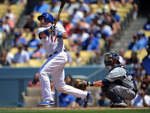 Los Angeles Dodgers catcher A.J. Ellis (17) hits a solo home run in the fifth inning against the Milwaukee Brewers at Dodger Stadium. (Gary A. Vasquez-USA TODAY Sports)