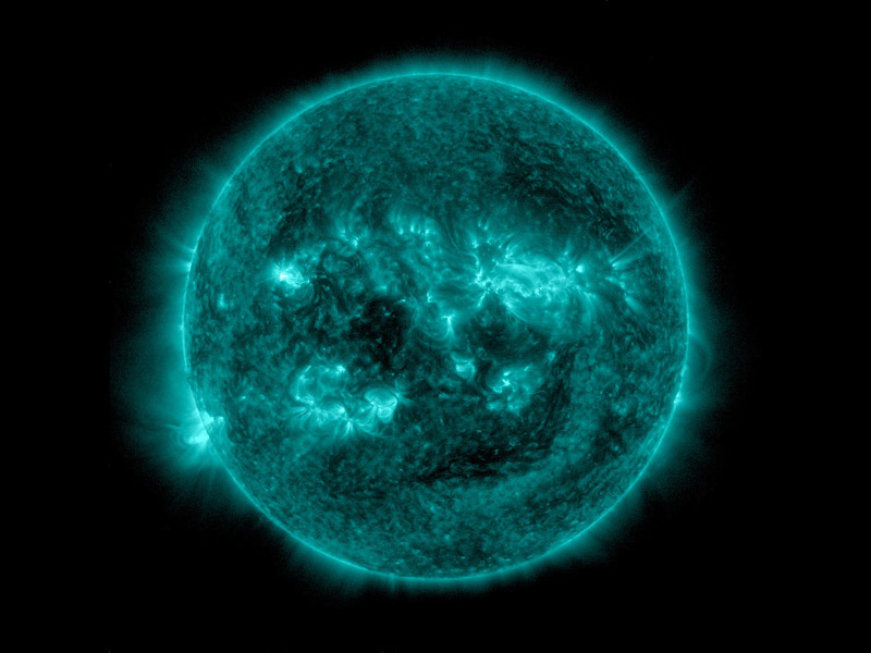 An eruption from the surface of the sun is conspicuous in the lower left portion of this July 6, 2015, image from NASA's Earth-orbiting Solar Dynamics Observatory. (Image credit: NASA)