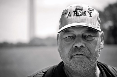 U.S. Army veteran, Hadley Williams, from Clarksville, reads a quote on the wall of the World War II memorial during a trip to Washington, July 25, 2015, sponsored by the Screaming Eagle Honor Flight organization. The Screaming Eagle Honor Flight is a Clarksville-based chapter of the Honor Flight Network, a non-profit organization that provides veterans with free flights to and from D.C. (Staff Sgt. Sierra A. Fown, 2nd Brigade Combat Team, 101st Airborne Division (Air Assault) Public Affairs)