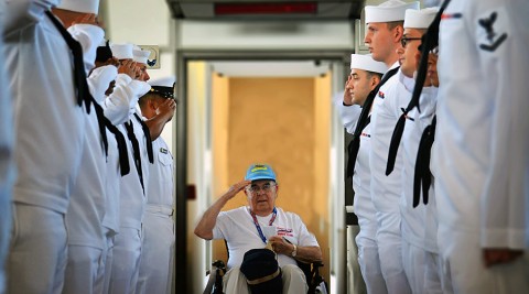 U.S. Marine veteran, Jim Devasher, a Bowling Green, Ky., native, points a name out on the Vietnam War Memorial Wall in Washington July 25, 2015. Staff Sgt. David Payton, 18th Airborne Corps and 101st Airborne Division NCO of the year was the guardian for Devasher during the Screaming Eagle Honor Flight. (Staff Sgt. Sierra A. Fown, 2nd Brigade Combat Team, 101st Airborne Division (Air Assault) Public Affairs)