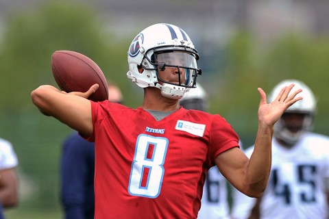 Tennessee Titans first round draft pick quarterback Marcus Mariota (8) passes during OTA drills at Saint Thomas Sports Park. (Jim Brown-USA TODAY Sports)